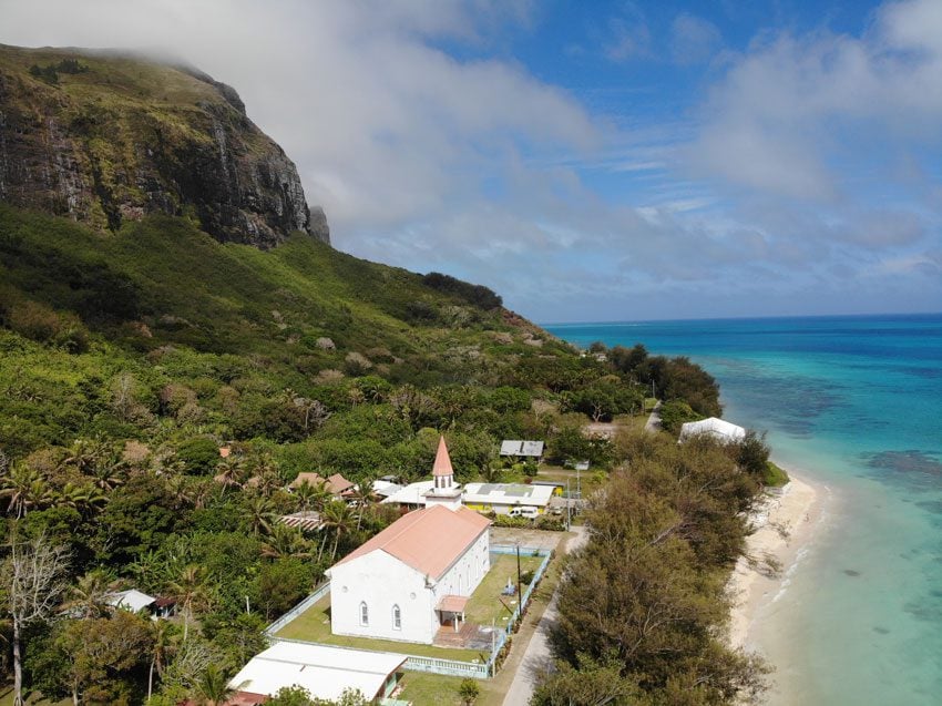 village and church - raivavae - austral islands - french polynesia