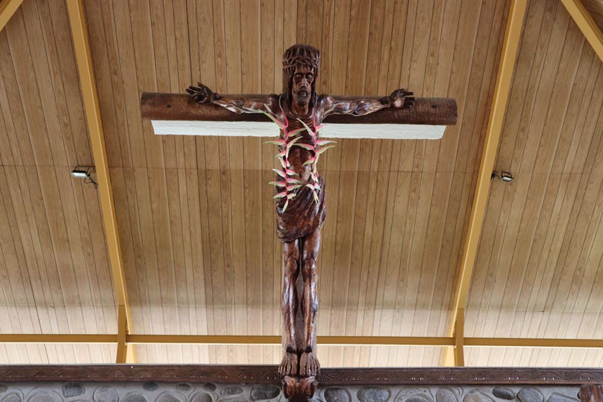 Crucifix in catholic church Ua Pou Marquesas Islands French Polynesia