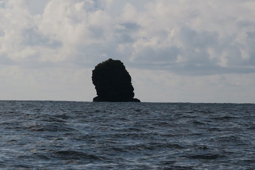 rock with man and woman Hanaiapa Village - Hiva Oa Marquesas Islands French Polynesia