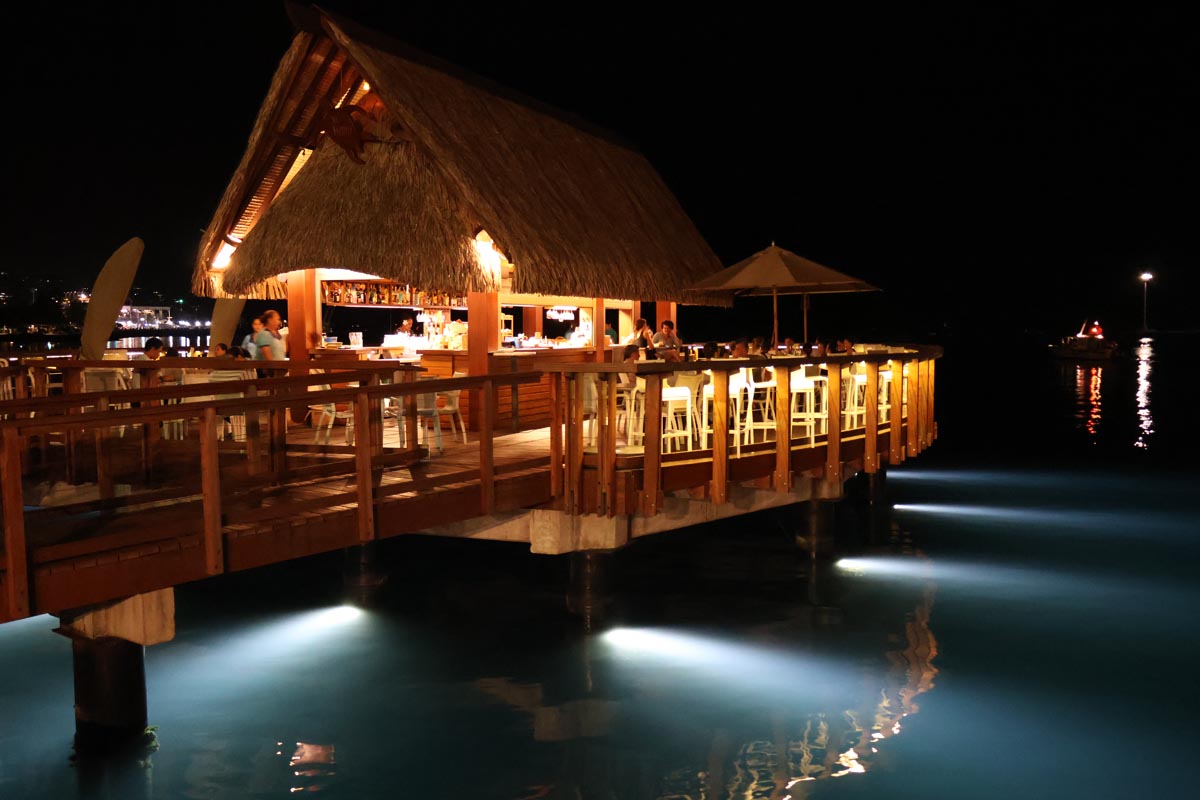 Overwater restaurant - Papeete waterfront promenade at night - Tahiti