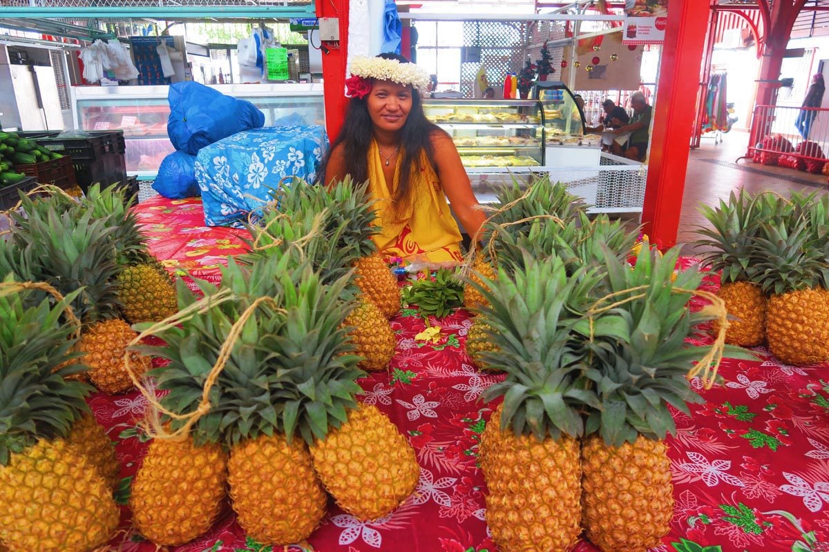 Papeete Central Market - Tahiti - woman with pineapples