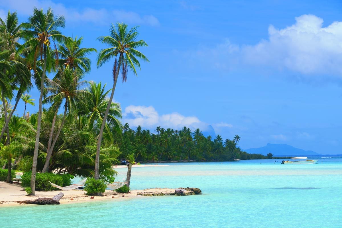 Tahaa travel guide - post cover - hammock on lagoon