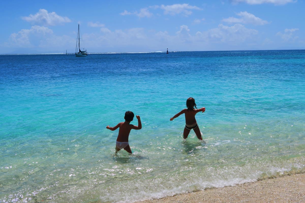 children playing at Fare beach - Huahine