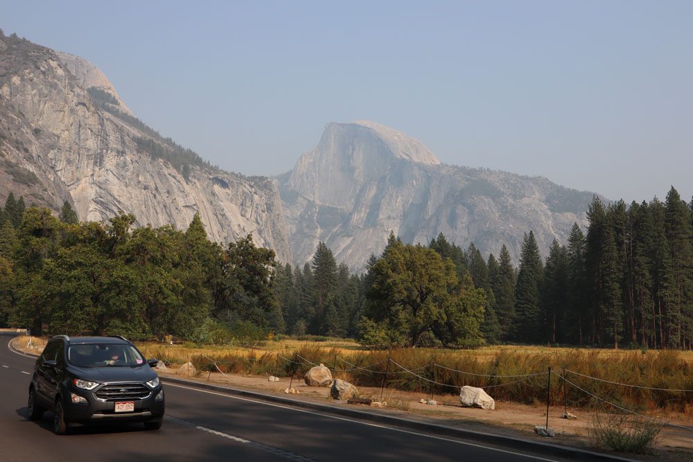 Driving in Yosemite Valley - Half Dome background