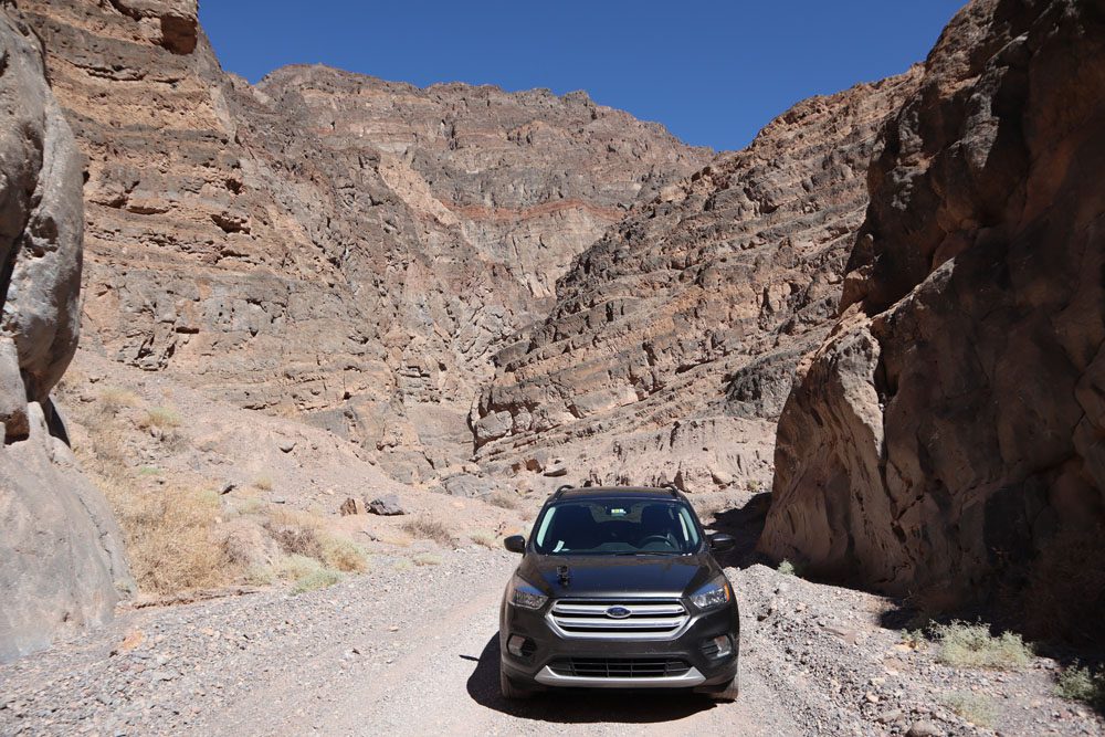 car in Titus Canyon Road death valley
