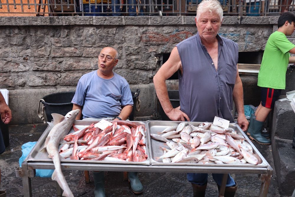 Sellers at Catania fish market - Sicily