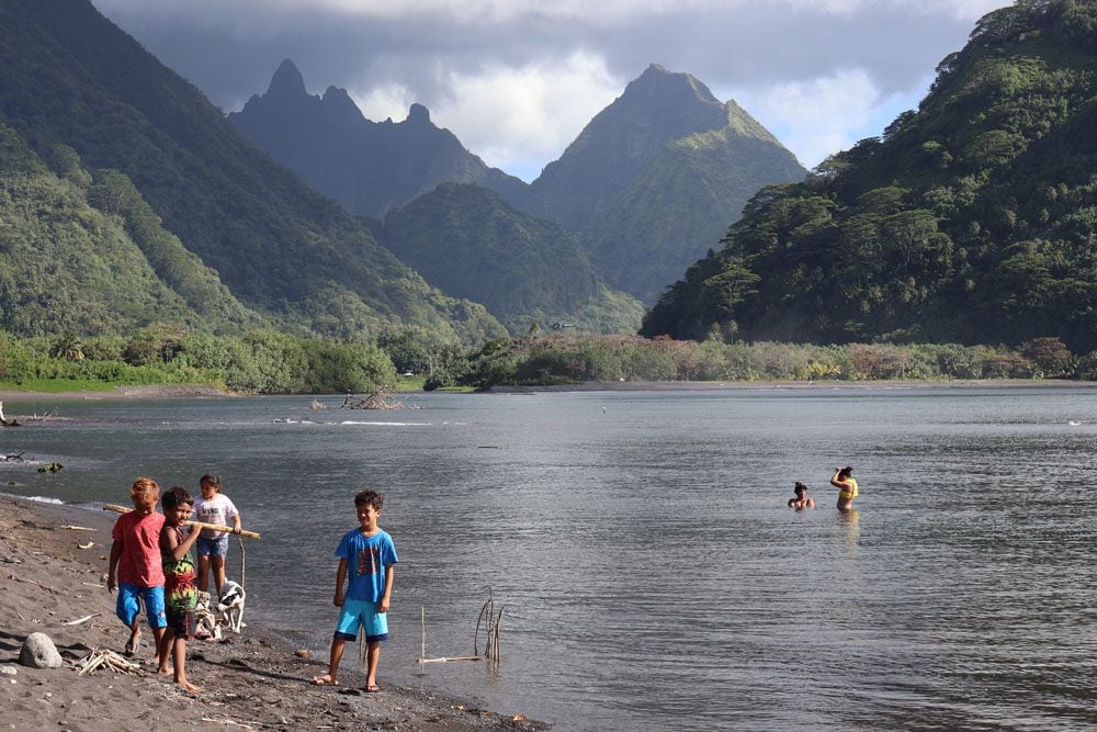 Children playing in Tautira Beach - Tahiti - French Polynesia