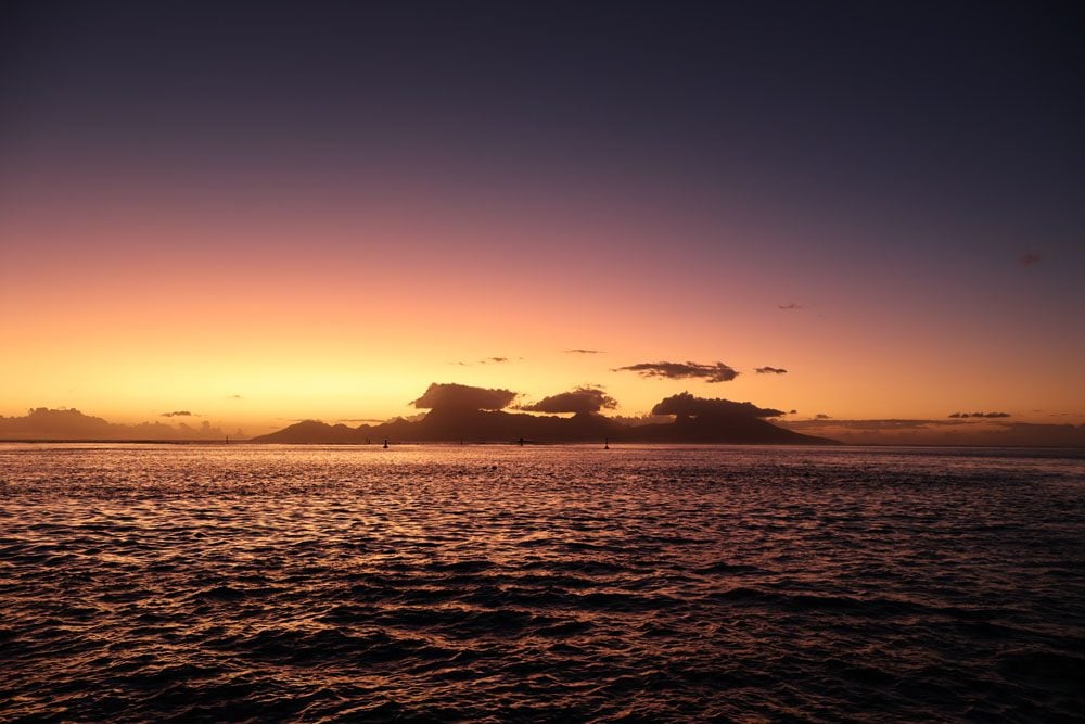 Sunset in Tahiti with Moorea in background