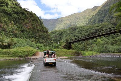 crossing river in Papenoo Valley - Tahiti - French Polynesia