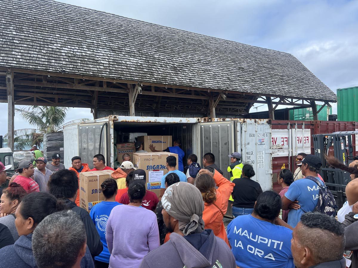 Cargo ship day in Maupiti - French Polynesia - unloading container
