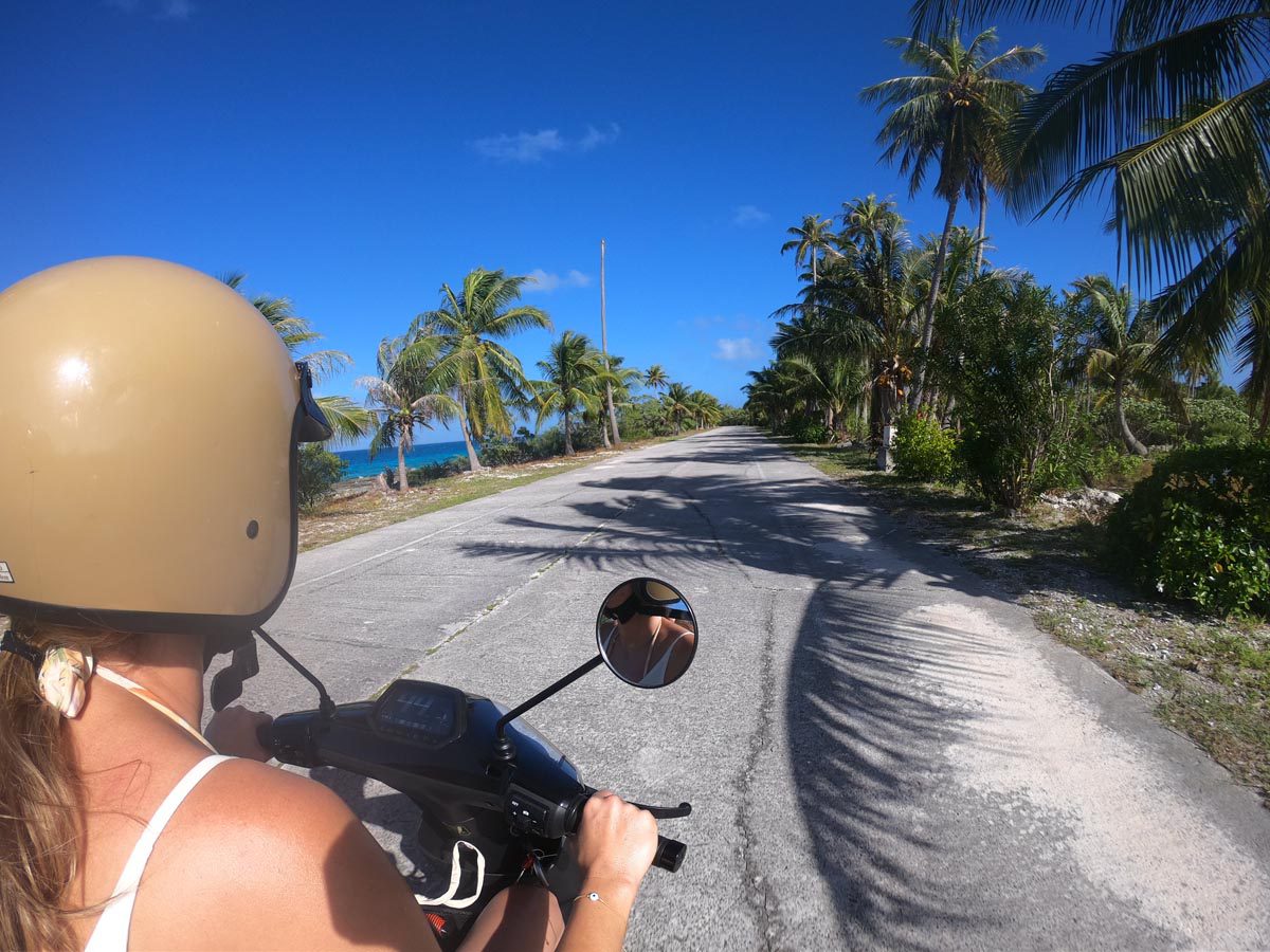 Riding-scooter-to-PK9-Beach-Fakarava-North-French-Polynesia