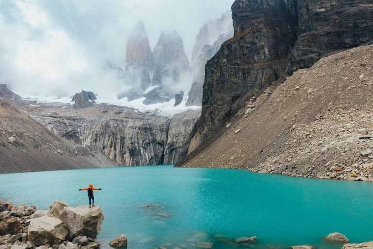 a hiker at a lake in Patagonia